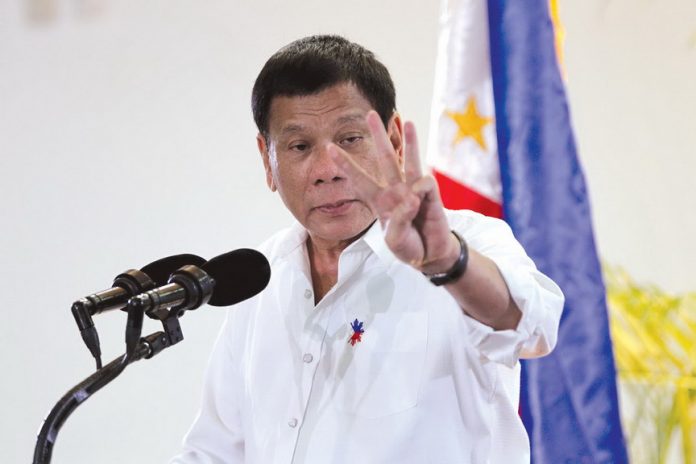 President Duterte gestures while delivering his arrival speech from Auckland, New Zealand and the Asia-Pacific Economic Cooperation (APEC) leaders' meeting in Lima, Peru at the Davao International Airport in Davao city on Wednesday night. Lean Daval J