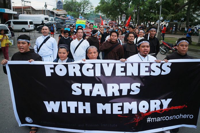 Religious groups on Friday join the march protest in Davao City against the burial a week ago of Ferdinand Marcos at the Libingan ng mga Bayani. Mindanews photo