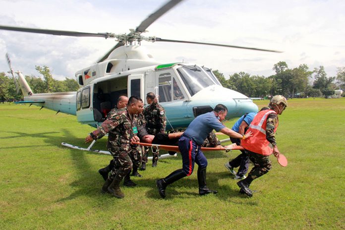 Four of the six wounded members of the Presidential Security Group were airlifted to Camp Evangelista, Cagayan de Oro City on Tuesday (29 Nov 2016), hours after they were ambushed by still unidentified gunmen in Marawi City. The vehicle they were riding also reportedly hit a landmine in Barangay Matampay, Tuesday morning. They were on their way to Butig town as part of the advance party of President Rodrigo Duterte, who is scheduled to visit the town. Photo courtesy of Cpl. Jordan Galicano / 4ID CMO