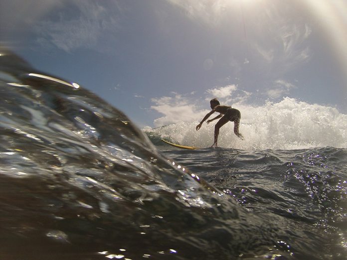 A local surfer enjoys the barreling waves in Sitio Paradise in the village of Union in Dapa town, Siargao Island, Surigao del Norte. Mindanews File Photo by Roel N. Catoto