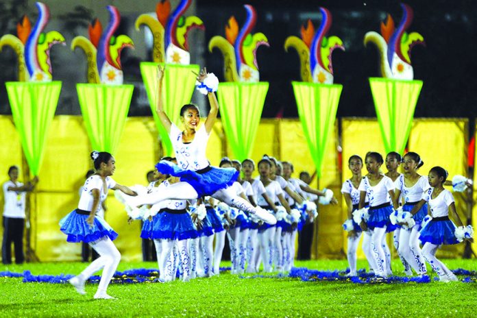 OPENER. A student performs ballet dance routine during a field demonstration as part of the opening of Batang Pinoy 2016 National Championships at the Davao del Norte Sports and Tourism Complex in Tagum City on Sunday night. LEAN DAVAL JR.