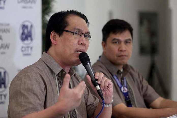 FUND SUPPORT. Overseas Workers Welfare Administration (OWWA) 11 director Eduardo Bellido (left) told reporters of the P50,000 financial assistance to the family of John Earl Cagalitan, a two-year old boy who died after allegedly mauled by his guardian in Calinan, Davao City. Bellido, together with Welfare Case officer Rey Elaya (right), made the announcement during yesterday’s Kapehan sa Dabaw at the SM City Annex in Davao. Lean Daval Jr.