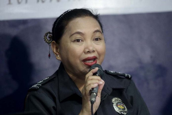 Davao City Jail warden Grace Taculin. Lean Daval Jr