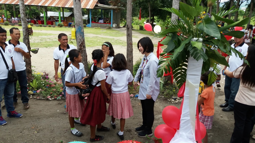 Miwa Yamatoya (right) Second Secretary and Press Officer of the Embassy of Japan in the Philippines talked to students after the formal turn-over of three units of two-classroom buildings in Dumadalig Integrated School in Tantangan, South Cotabato. ALEXANDER LOPEZ