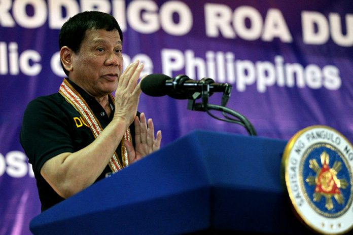 President Rodrigo Roa Duterte addresses the graduates of the Motorcycle Riding Course Class 06-2016 in a ceremony at the Felis Resort Complex in Davao City on December 2, 2016. SIMEON CELI JR./Presidential Photo