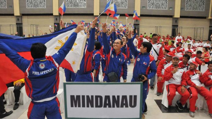 BIMP EAGE GAMES. Members of the Davao-Philippines delegation during the opening program of the 9th BIMP-East Asean Growth Area Friendhsip Games in Samarinda, East Kalimantan, Indonesia. Mikey Aportadera photo