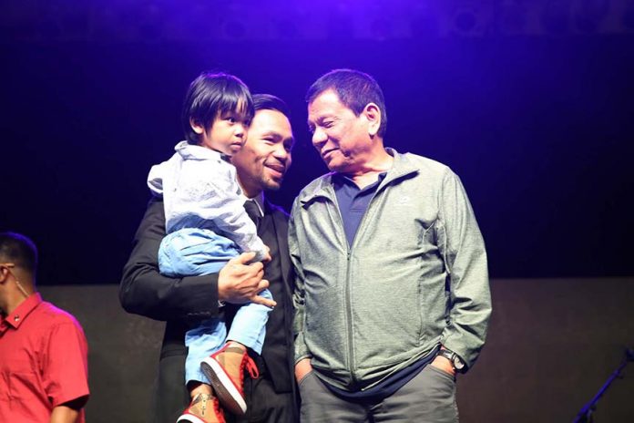 TOP-LEVEL GUEST. President Rodrigo Roa Duterte attends Senator Emmanuel 'Manny' Pacquiao's 38th birthday celebration at the KCC Mall Events & Convention Center in General Santos City on Saturday night. RICHARD MADELO/Presidential Photo