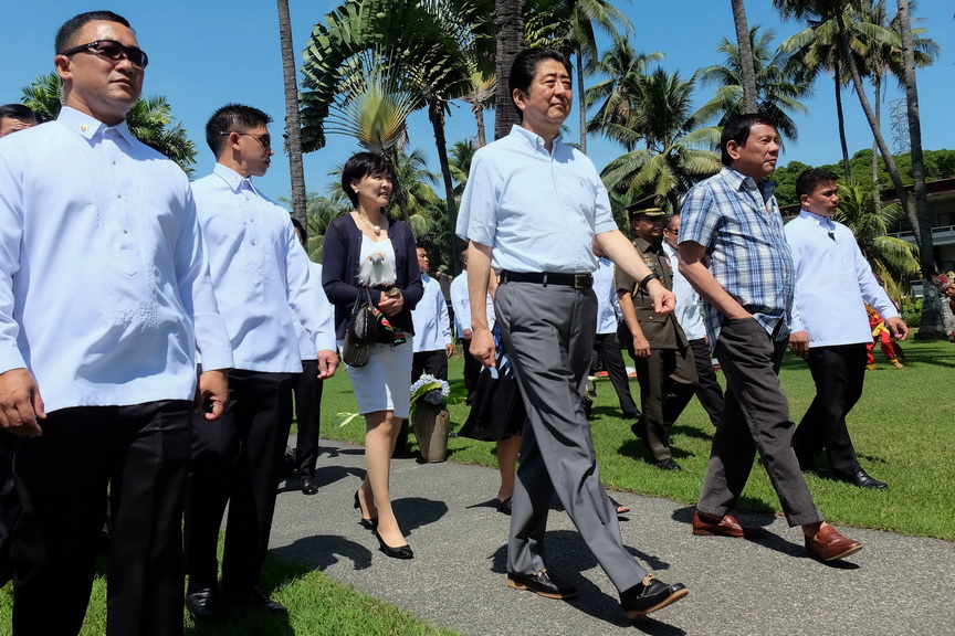 President Rodrigo RoaDuterte and Japan Prime Minister Shinzo Abe arrive at the Waterfront Hotel in Davao City to attend a series of events to cap off the Prime Minister's official visit to the Philippines on January 13, 2017. RENE LUMAWAG/Presidential Photo