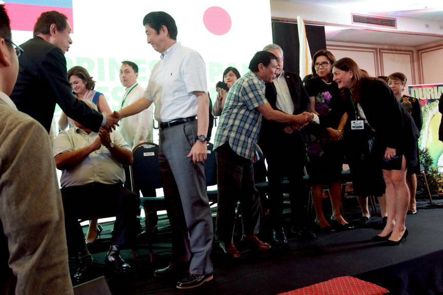 President Rodrigo Roa Duterte and Japan Prime Minister Shinzo Abe greets the business leaders after the Japan-Philippines Business Forum held at the Waterfront Hotel in Davao City on January 13, 2017. The Prime Minister of Japan attended the forum as part of the last day of his official visit to the Philippnes. ROBINSON NIÑAL/Presidential Photo