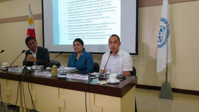 DC DEVELOPMENT GOALS. Top officials of the Davao City government, the National Economic and Development Authority (NEDA) and the  Japanese International Cooperation Agency  (JICA) briefed members of the Davao media on the  comprehensive Davao City Infrastructure Development and Capacity Building Project outlining midterm and long term strategies to help sustain economic development in the city. From right: lawyer Tristan Dwight Domingo, assistant city administrator; Ms Ma. Lourdes D. Lim, NEDA region 11 director, and JICA Philippine team leader Ken Kumazawa.  ANTONIO M. AJERO