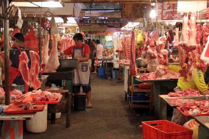 BACK TO SQUARE ONE. Meat vendors at Agdao Public Market are experiencing quiet days anew as business became slow after the Christmas holidays. LEAN DAVAL JR.