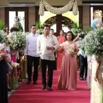 TAKES TWO TO TANGO. President Rodrigo Roa Duterte and former President, now incumbent Pampanga 2nd District Representative Gloria Macapagal Arroyo walks on the center aisle of Sanctuario de San Jose in Mandaluyong City on Sunday as principal sponsors durin