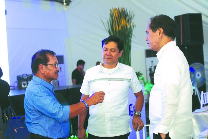 LENDING AN EAR. Former Department of Agriculture secretaries Luis Ramon Lorenzo (center) and Senen Bacani listen as current DA secretary Emmanuel Piñol seems to be stressing a point during yesterday’s plant inauguration of Franklin Baker Company of the Philippines in Darong, Sta. Cruz, Davao del Sur. Piñol was the keynote speaker of the event where he laid out the plans of the Duterte administration for the agriculture sector. LEAN DAVAL JR.