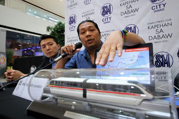 CLOSE TO HOME. Philtram founder and chief operating officer Jose L. Guardo Jr. (right), together with China Railway Engineering consultant Jiang Zhiping, says the planned $28 billion 14-kilometer monorail system for Davao City, with a route stretching from Panacan to Roxas Avenue, will be realized once the feasibility study is completed. Guardo made the disclosure during yesterday’s Kapehan sa Dabaw at the Annex of SM City Davao. LEAN DAVAL JR.