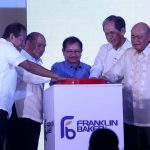 FRESH START. Franklin Baker Company of the Philippines president and chief executive officer Jerome Lorenzo (second from left), vice Chairman Peter D. Garrucho Jr. (rightmost), independent director Senen Bacani (second from right) and Darong plant manager Ronaldo Santos (leftmost), together with Department of Agriculture (DA) secretary Emmanuel Piñol, lead the ceremonial start of plant operations during yesterday inauguration of the company’s Darong plant in Darong, Sta. Cruz, Davao del Sur. LEAN DAVAL JR.