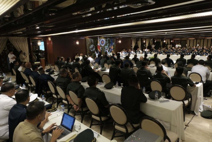 FIRM ON THE SADDLE. President Rodrigo Duterte presides over the first Armed Forces of the Philippines-Philippine National Police (AFP-PNP) Joint Command Conference held in Malacañan on Friday night. KING RODRIGUEZ/Presidential Photo