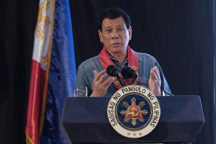 In a bid to fulfill his campaing promise of eradicating corruption, President Rodrigo Roa Duterte announces in his speech during the 38th National Convention of the Philippine Association of Water Districts at the SMX Convention Center in Davao City on February 2, 2017, that he will find ways to summarily dismiss inefficient and erring government workers. RENE LUMAWAG/Presidential Photo