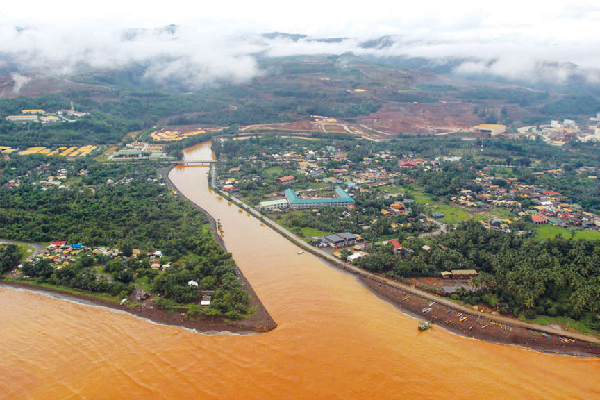 BUSINESS AS USUAL. One of the oldest nickel mining companies in Surigao – Taganito Mining Corporation – operates in the mountains of Claver, Surigao del Norte, as can be seen in in the background in this photograph taken Monday (20 February 2017). The subsidiary of Nickel Asia Corporation has been in business for decades, causing the water bodies nearby to turn rusty-red with laterites. It is not among the 14 erring mining firms in the Caraga Region ordered closed by Environment Secretary Gina Lopez as it is reportedly among those who passed the audit. (MindaNews photo by Roel N. Catoto)