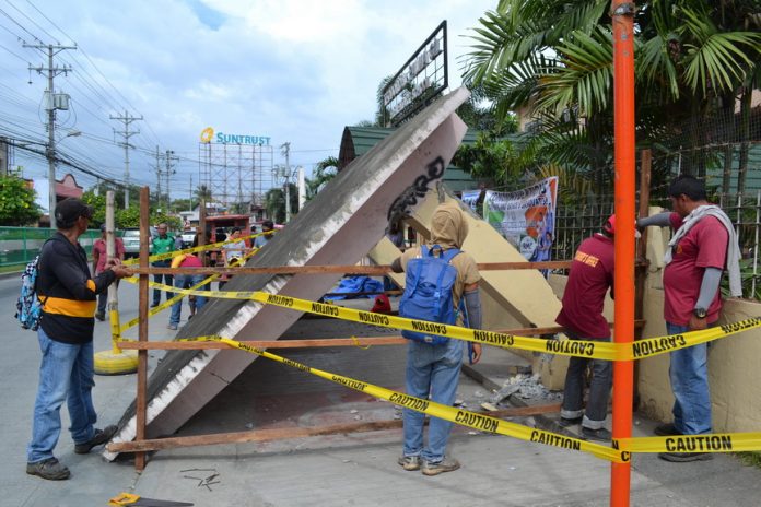 STRONG QUAKE. This old waiting shed in front of Palma Gil Elementary School in Quirino Street, Davao City collapsed when a magnitude 4.6 tremor struck the city 9:50 a.m. on Thursday. Two persons were injured during the incident. JERMAINE DELA CRUZ