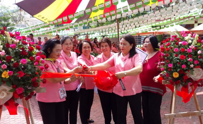 DSWD @66. Members of Management Committee of the Department of Social Welfare and Development (DSWD) Region XI led by Director Mercedita P. Jabagat [second from right] cut the ceremonial ribbon on Monday to mark the opening of the week-long celebration of the DSWD 66th Founding Anniversary. Theme for the observance is Sama-samang Paglilingkod ng may Malasakit. Other ManCom members are [from left] ARD for Administration Ma. Vilia L. Vigil, Chief Admin. Officer Teresita V. Mercado, Institutional Development Chief Ma. Elena S. Labrador, Policy and Plans Chief Estrella D. Brigole and ARD for Operations Rebecca A. Santamaria. (DSWD Photo)