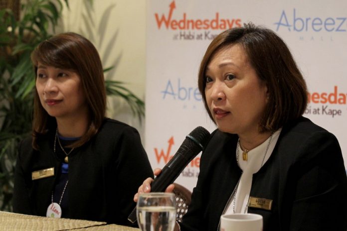 COPING WITH A CHALLENGE. Land Bank of the Philippines (LBP) vice president and head of Davao Lending Center Charlotte Conde (right) says the Lending Center of LBP is allocating bigger budget of P2 billion to its loan portfolio for Davao Region to serve another batch of small farmers and fishermen, large agribusinesses and even Local Government Units (LGUs). Conde, together with accounts management officer Lilibeth Alvarez, made the disclosure during yesterday’s Wednesdays @ Habi at Kape at Abreeza Mall. LEAN DAVAL JR.