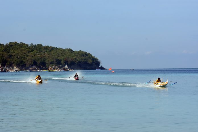 BOAT RACE. Participants from all over SOCSKSARGEN area race with their motorized boats during the bancarera on Saturday, April 22, as among the highlight activities of the 7th Mahin Festival in Glan, Sarangani province. Bancarera turns out to be a yearly anticipated activity with its growing number of enthusiasts joining. It also staged a race for non-motorized boats. (Jake Narte/ SARANGANI INFORMATION OFFICE)