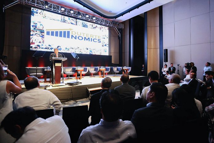 DUTERTENOMICS FORUM. Finance Secretary Carlos Dominguez III, in his keynote speech, highlighted the need to implement a comprehensive tax reform program and to boost infrastructure spending to spur the growth of the country’s economy during the DuterteNomics forum yesterday. PRESIDENTIAL PHOTO