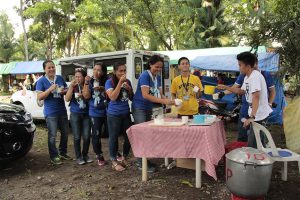 32nd Eastern Mindanao Regional Encampment staff line up for the the free lugaw given by City Mayor’s Office. Photo by Joie Maine A. Gelmo