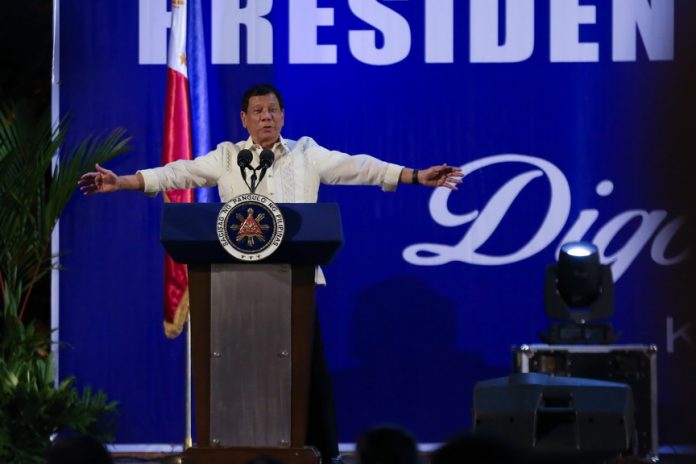 STRESSING A POINT. President Rodrigo Duterte gestures as he delivers his speech during the Digong's Day for Women at the Kalayaan Grounds in Malacañang on Friday afternoon. ALBERT ALCAIN/Presidential Photo