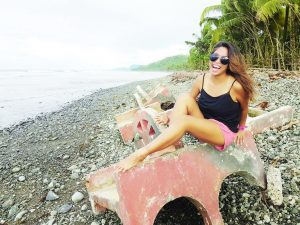 This rocky shore just a little walk in front of Mami’s Surf Camp in Lanuza has old washed-up concrete chairs that are now damaged by the sea but is a great spot to take photos and look at people surfing. Photo by Lisa Caldini.