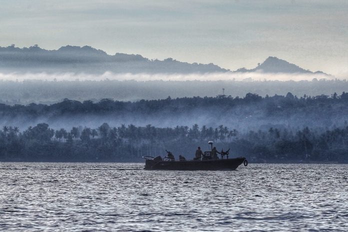 SECURED. Security forces belonging to the Philippine Navy conduct a routine sea patrol between Davao City and Island Garden City of Samal (IGaCoS) on Sunday. The Philippine Navy is among the agencies that provided security as the Department of Tourism (DOT) 11, local government unit of IGaCoS and private sector held tourism-related summer activities in the island. LEAN DAVAL JR.