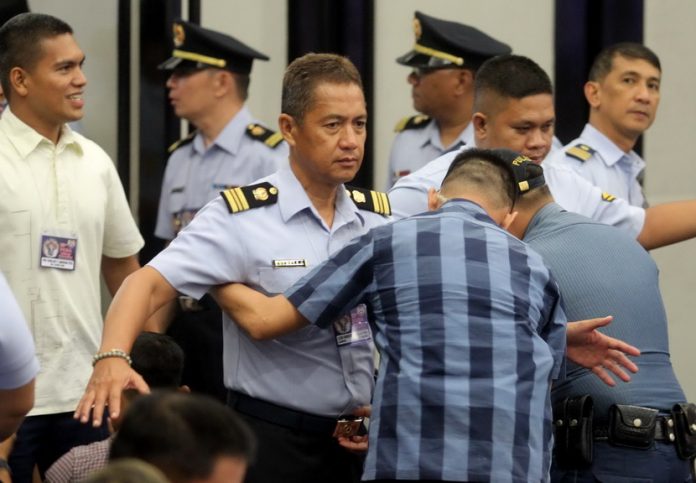 NONE EXEMPTED. A member of the Philippine Coast Guard Auxiliary undergoes strict full body pat-down search upon entering the venue of the 33rd PCGA National Convention held at SMX Convention Center on Friday afternoon where President Duterte was the keynote speaker. LEAN DAVAL JR.