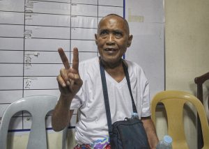 WANTED PATRIARCH. Cayamora Maute, father of Maute terrorist group leaders Omar and Abdula Maute, flashes a peace sign upon his presentation to the media during a news conference at Camp Domingo Leonor in Davao City on Tuesday. The elder Maute was arrested at the joint checkpoint of Task Force Davao and the police operatives in Sirawan, Toril, Davao City on Tuesday morning. LEAN DAVAL JR.