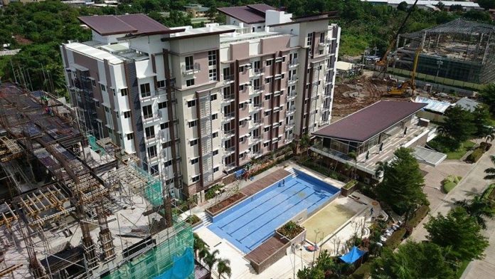 FIRST CONDO BUILDING. The Matina Enclaves' Building B/1 with the pool on foreground.