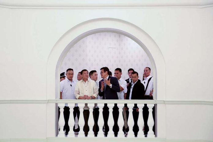 NEW ESTABLISHMENT. President Duterte is given a tour inside the Rizal Park Hotel in Manila during its grand opening on Wednesday night. Touring the President is Rizal Park Hotel Chairman Simon Paz. SIMEON CELI JR./PRESIDENTIAL PHOTO