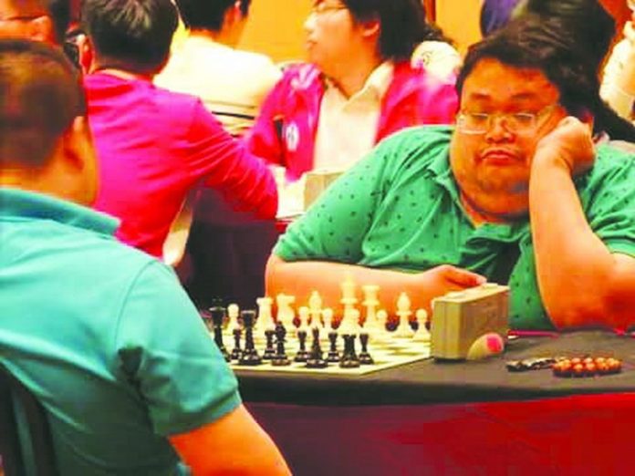 PWD BET. Veteran internationalist Henry Lopez (right) will be a strong bet among PWD players.