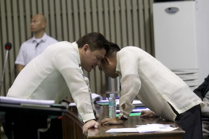 PRIVILEGED COMMUNICATION. Davao City Vice Mayor Paolo Duterte seems to be conferring very important matters with Councilor Bernard Al-ag as the City Council tackles with the executives of the Davao City Water District (DCWD) the current water shortage problem in various areas of District 2 during the regular session at Sangguniang Panlungsod on Tuesday. LEAN DAVAL JR.