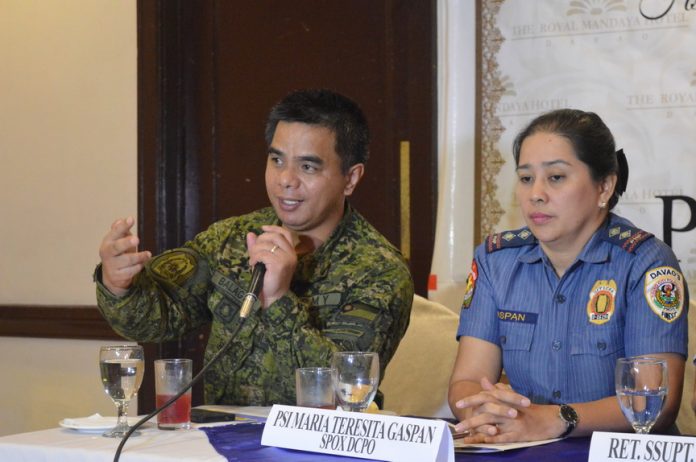 COMPLIANT. Major Ezra Balagtey, East Mindanao Command spokesperson assures the public that the one year extension of the martial law in Mindanao will be ruled by necessity, proportionality, rule of law and respect for human rights during the AFP-PNP Press Corps Southern Mindanao Media Briefing on Thursday. Together with him is PSI. Maria Teresita Gaspan, Davao City Police Office spokesperson. ANGIE SAVERON