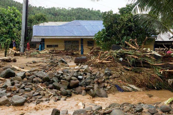 Rocks, mud and other debris came down from the mountains in Barangay Alipao, Alegria, Surigao del Norte as Typhoon “Basyang” bashes the Caraga Region Tuesday morning (13 February 2018). Photo courtesy of PONTIOUS GOGO via Mindanews