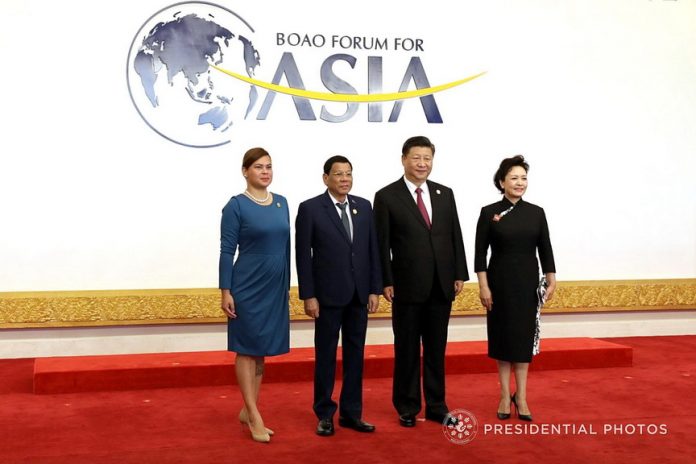 WITH PRESIDENT XI AND FIRST LADY. President Rodrigo Duterte and Davao City Mayor Sara Duterte-Carpio pose for a photo with People’s Republic of China President Xi Jinping and his wife Peng Liyuan prior to the opening ceremony of Boao Forum for Asia (BFA) Annual Conference 2018 at the BFA International Convention Center in Boao, People’s Republic of China on Tuesday. PRESIDENTIAL PHOTO