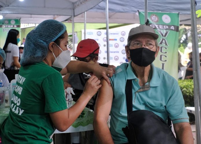 An elderly man receives a dose of a vaccine against Covid-19 at one of Davao City's vaccination hubs. Senior citizens and frontline healthcare workers ages 18 years old and above may now get their second booster dose as the Department of Health (DOH) already issued a memorandum citing the guidelines on the administration of the second Covid-19 vaccine booster doses. Edge Davao