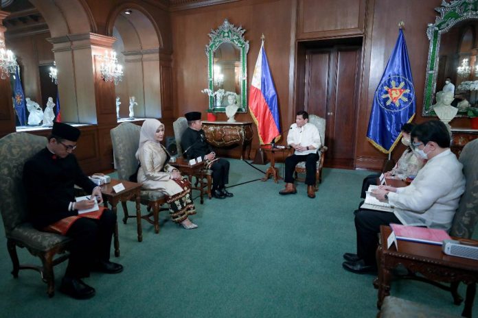 President Rodrigo Duterte discusses matters with H.E. Agus Widjojo, Ambassador of the Republic of Indonesia to the Philippines, during a short audience with the President after the presentation of credentials at the Malacañang Palace on May 25, 2022. PRESIDENTIAL PHOTO