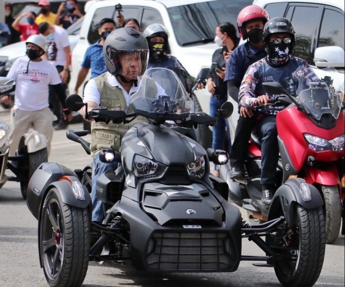 President Rodrigo Duterte, on a Can-Am on-road motorcycle, gets ready to depart near his home in Davao City for an out of town ride to Tagum City, Davao del Norte on Wednesday afternoon. On May 28, the President also made an out of town ride to Digos City. Edge Davao