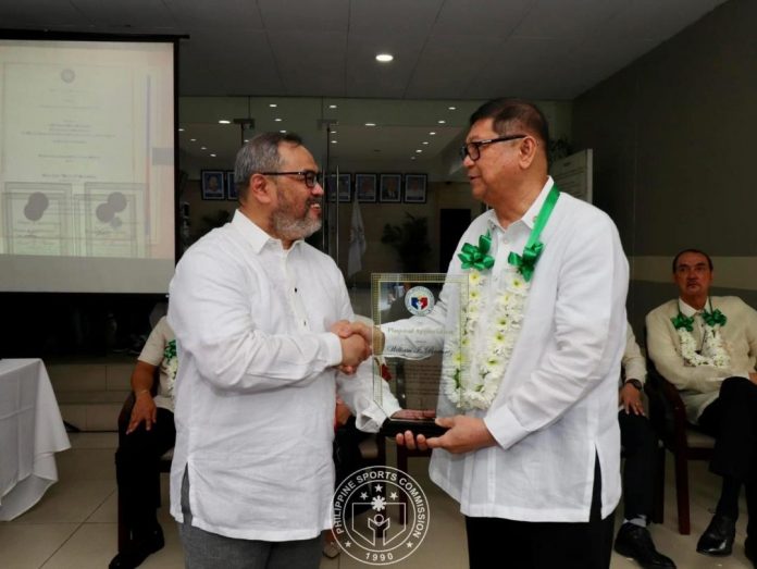 Outgoing PSC chairman Butch Ramirez is sent off by executive director Atty. Guillermo Iroy, Jr. PSC