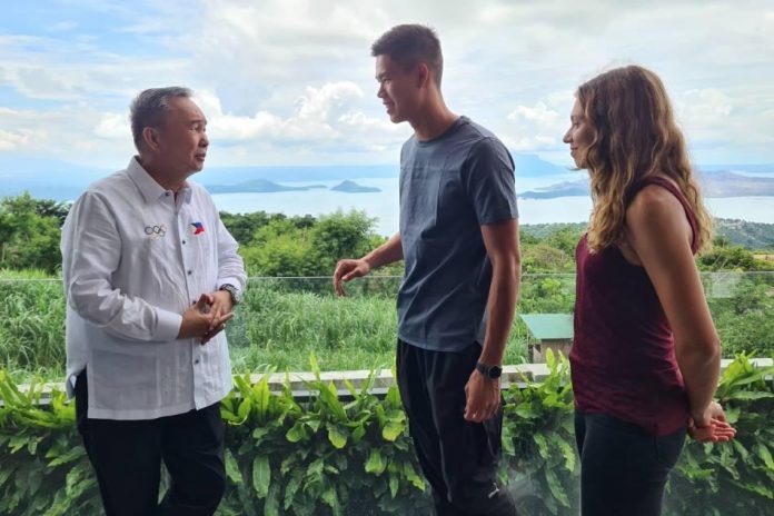 Filipino pole vaulter EJ Obiena (center) and his girlfriend, German long jumper Caroline Joyeaux, with POC President Rep. Abraham 'Bambol' Tolentino. Handout photo