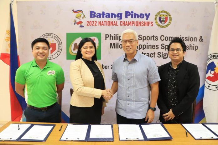 (L-R) Nestle Philippines Inc. Assistant Vice President for Milo Sports Carlo Sampan, Beverages and Confectionary Business Executive Officer Veronica Vargas-Cruz, PSC Chairman Noli Eala and PSC Accounting Head Erik Jean Mayores formally signed partnership for the upcoming 2022 Batang Pinoy National Championships on Monday held at the Rizal Memorial Sports Complex, Manila.