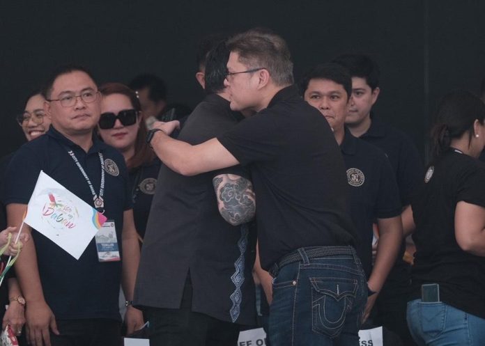 Davao City First District Representative Paolo Duterte exchanges pleasantries with his younger brother, Mayor Sebastian Duterte, upon his arrival during Parada Dabawenyo at San Pedro Square on Saturday. Rep. Duterte recently released his accomplishments from October 2022 to March 2023 as a second-term member of the House of Representatives.LEAN DAVAL JR.