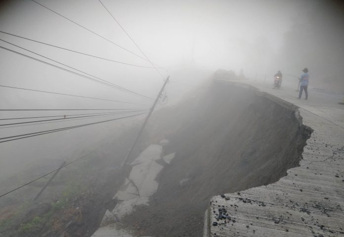 Landslide-hit road along Davao-Buda Highway in Sitio New Calinan, Barangay Baganihan, Marilog District, Davao City. ( Photo Courtesy of Brgy. Marilog)