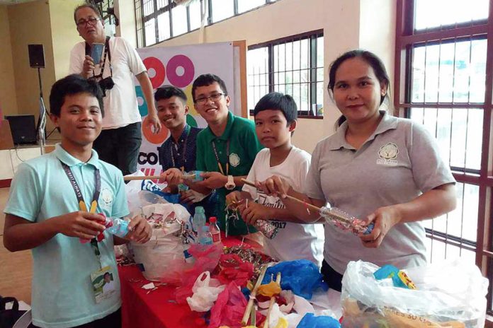 Students of Agusan del Sur National High School belonging to the Eco Savers Club making ecobricks. Photo courtesy of ASNHS Eco Savers Club