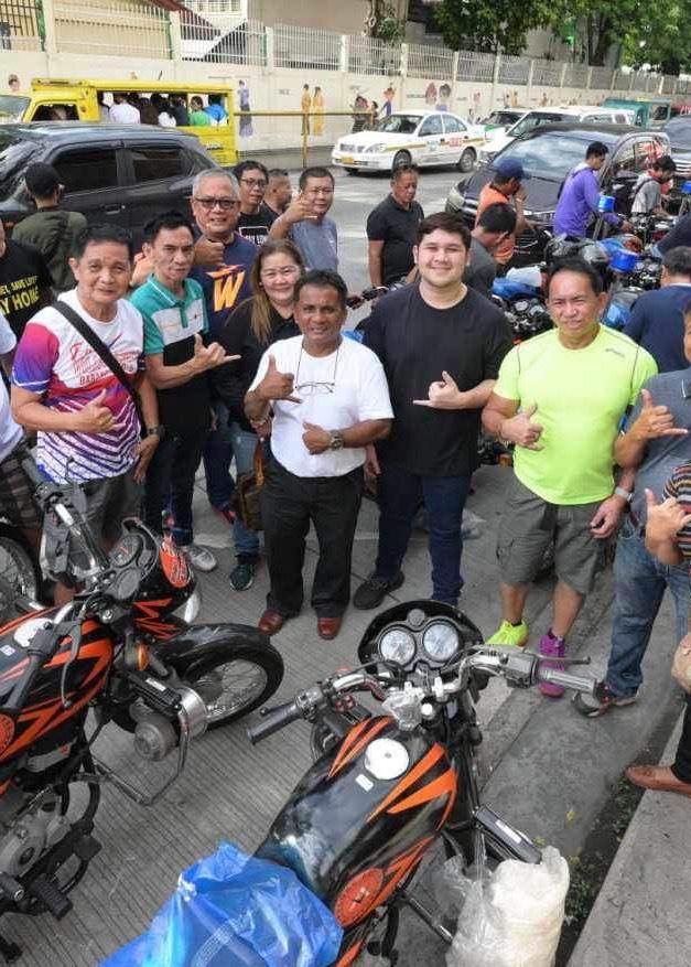 Davao City First Congressional District Representative Paolo “Pulong” Duterte, through his son Rodrigo “Rigo” Duterte II, distributes motorcycle equipment to some barangay police under the city's first district over the weekend.